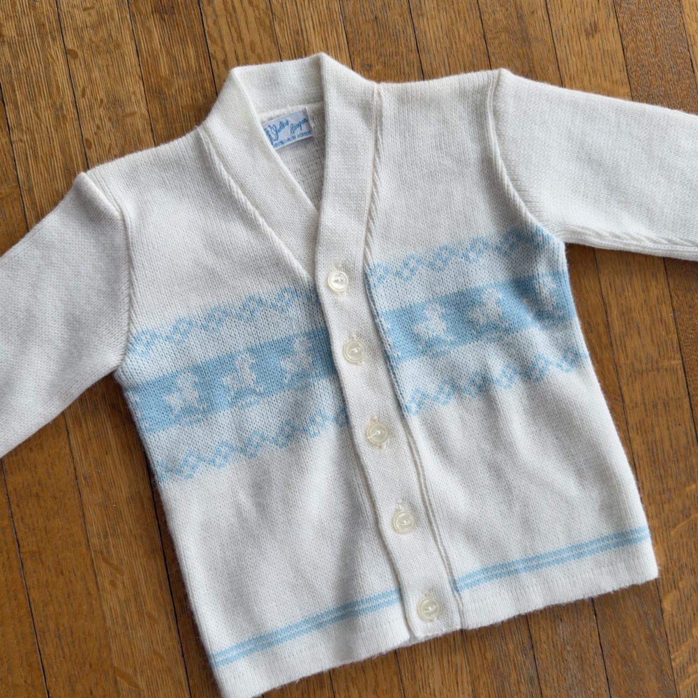 White and Blue Knitted Sweater with V-Neck and Stripes